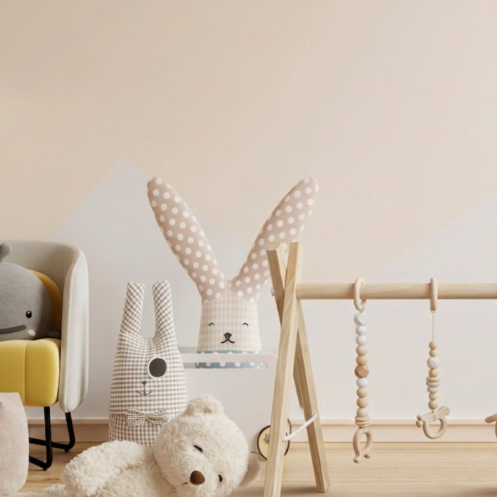 Wooden play gym with plush friends in nursery