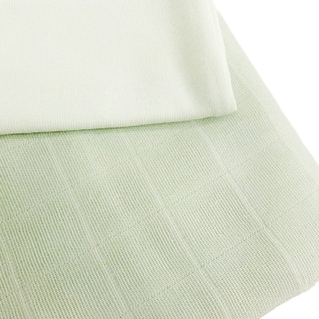 Mint muslin swaddle close-up