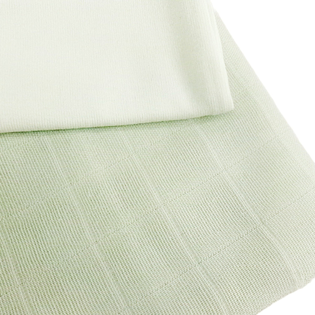 Mint muslin swaddle close-up