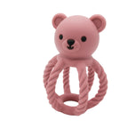 Pink bear-shaped toy with a rope on a white background