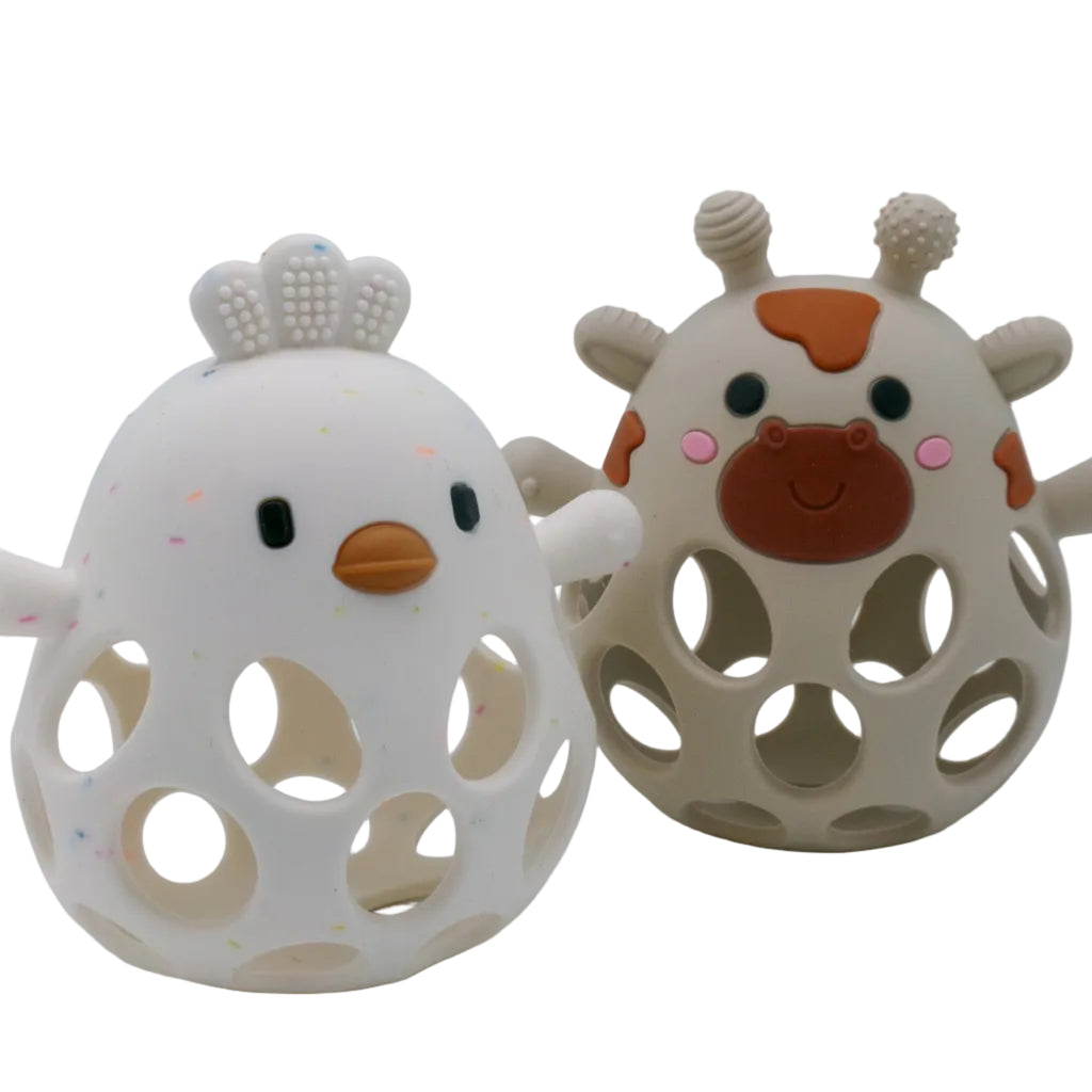 Two animal-themed baby teething balls on a white background