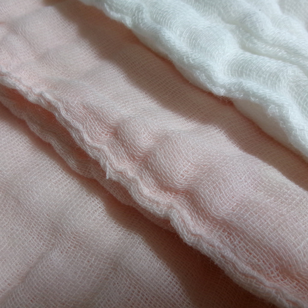 Close-up of pink and white textured fabric