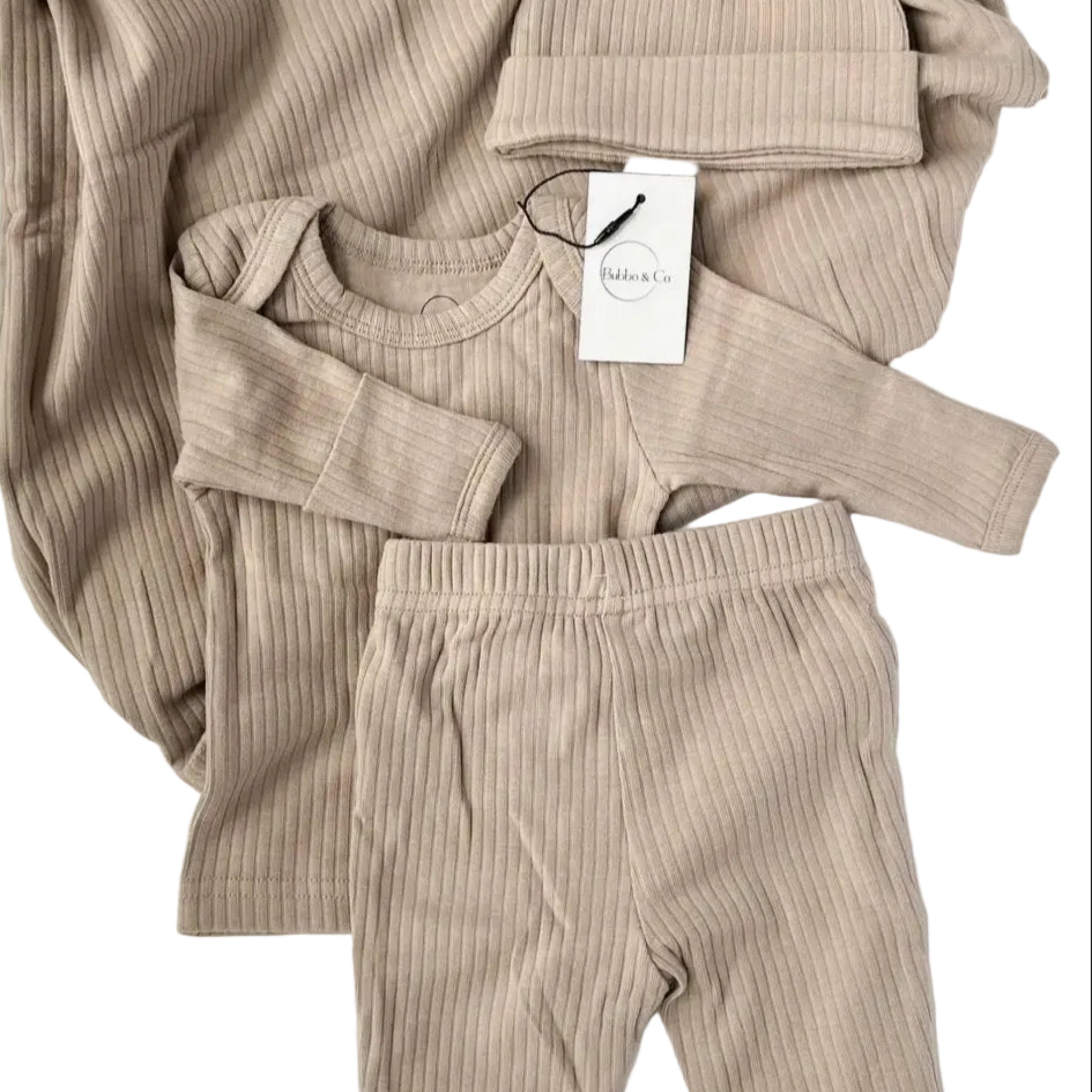 Beige ribbed baby outfit with matching hat and pants on a white background, featuring the brand 'Bubba & Co'.