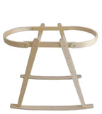 Wooden baby bassinet on a white background