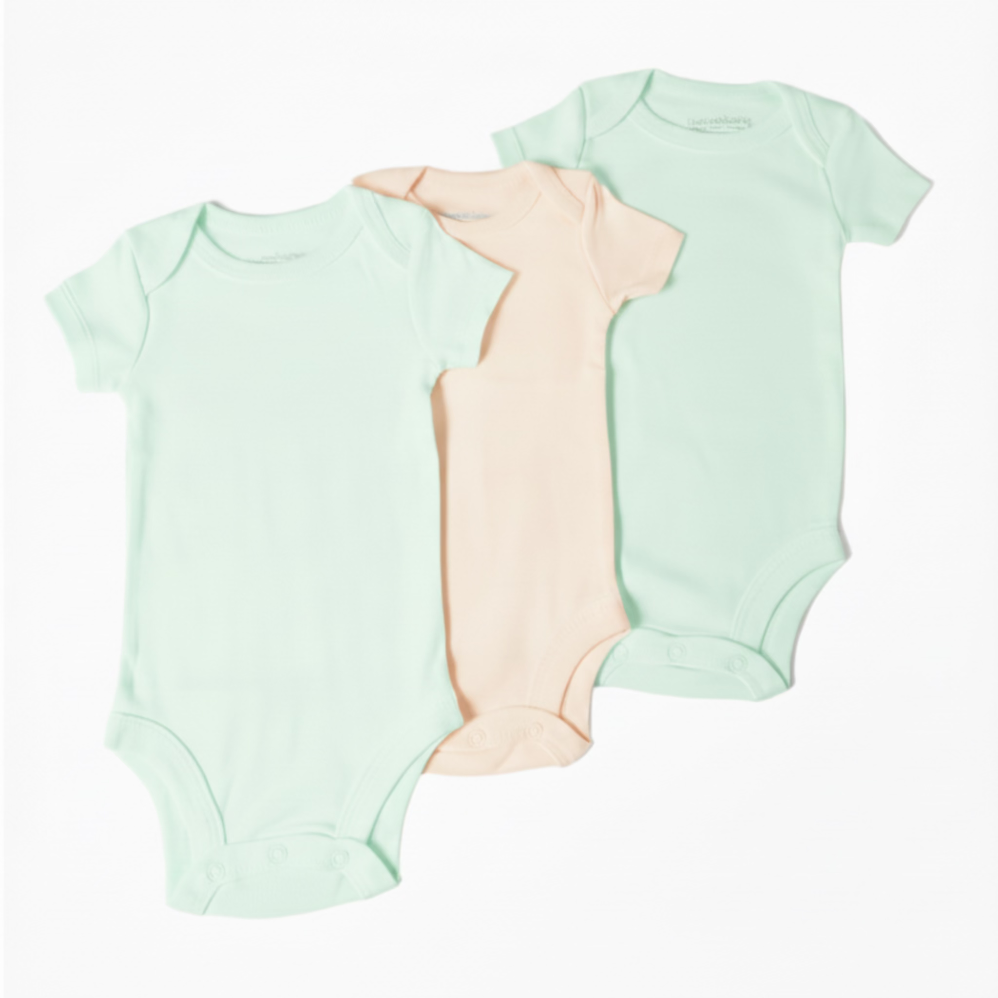 Three baby bodysuits in green and brown on a white background