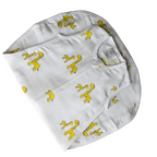 White bib with yellow patterns on a light gray background