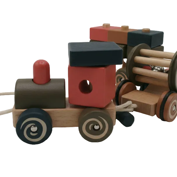 Wooden toy train set on a white background